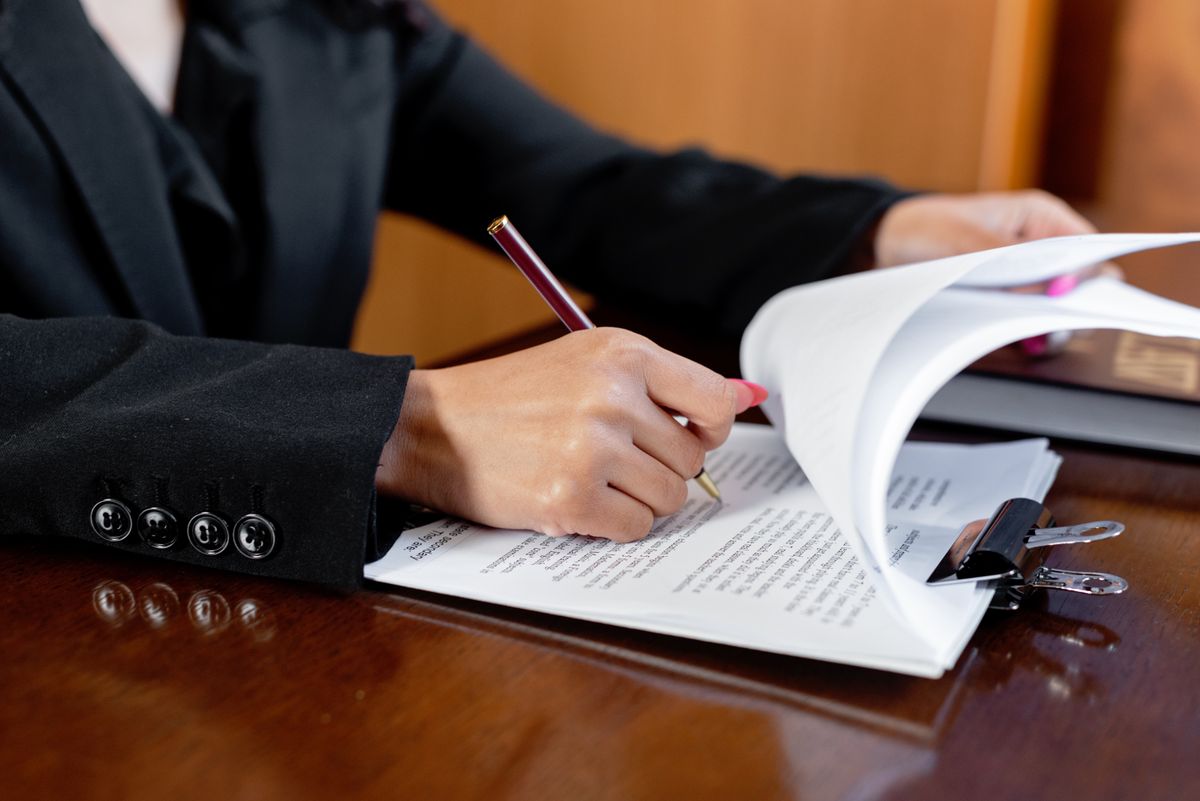 Legal paperwork being prepared and signed